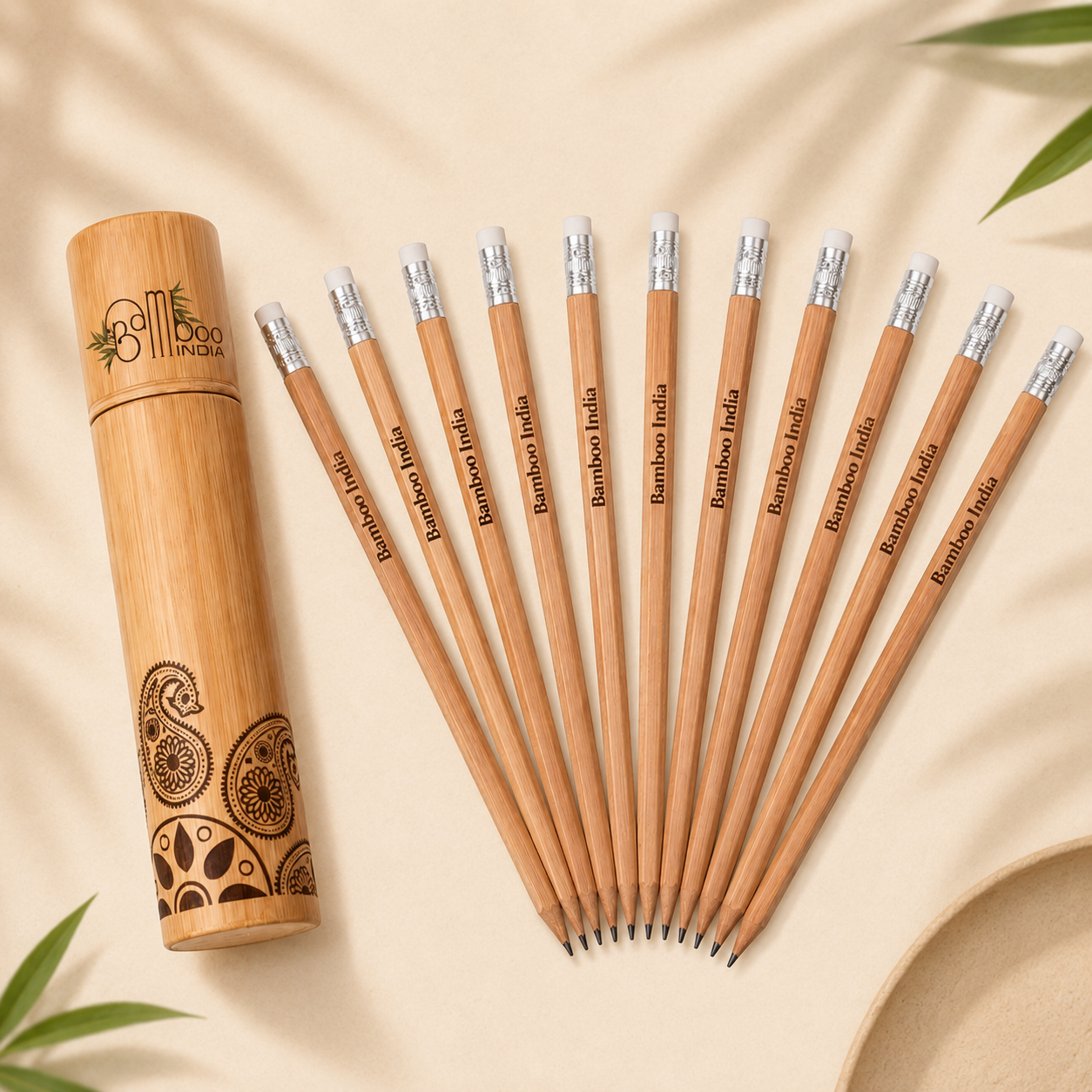 Bamboo India pencils and wooden holder on a beige background
